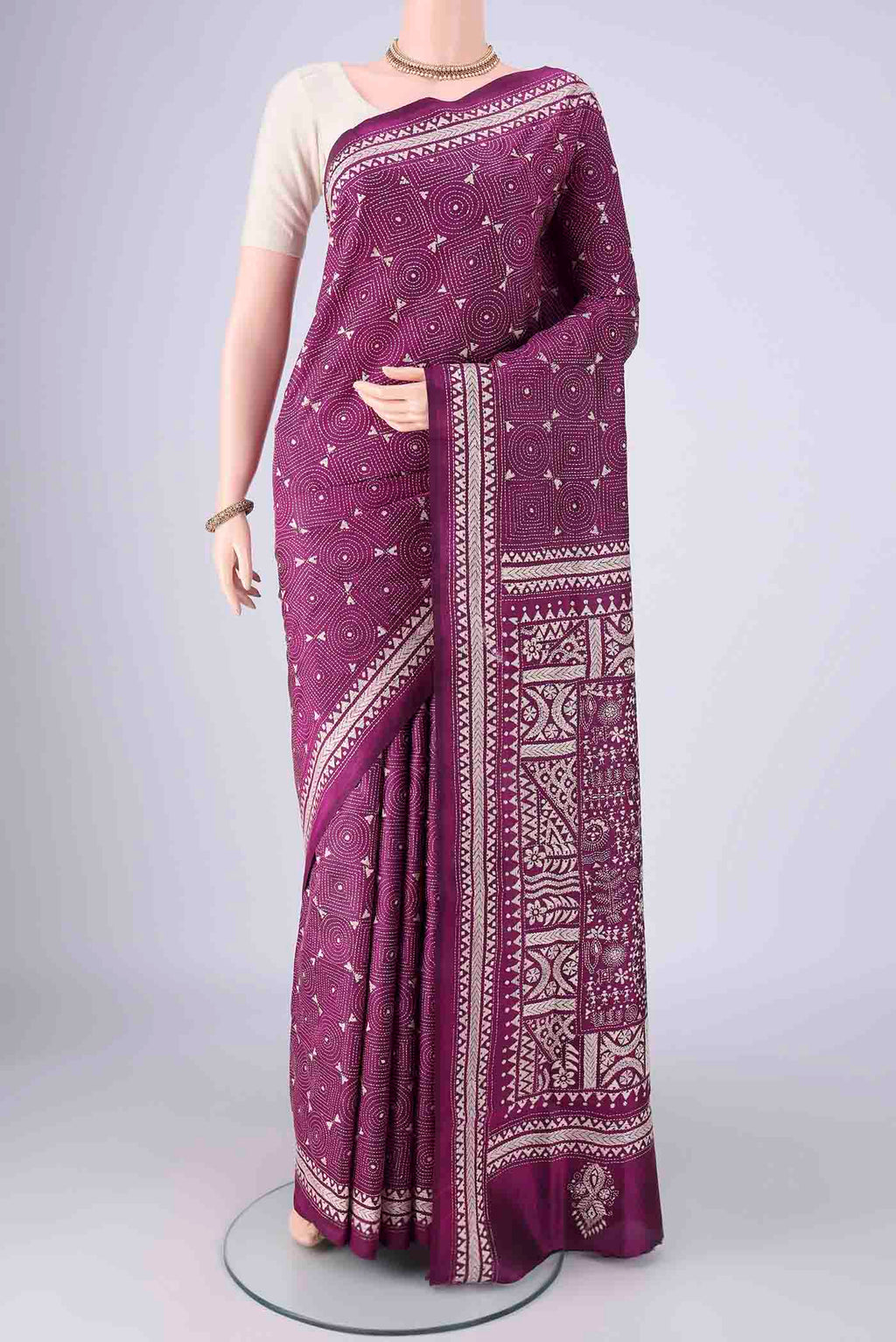 Magenta Kantha Silk Saree with Kantha Work on the body and Thread Border.  displayed on a mannequin