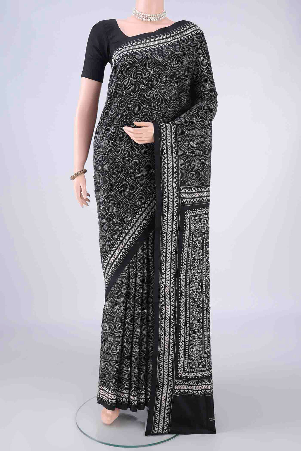 Black Kantha Silk Saree with Kantha Work on the body and Thread Border.  displayed on a mannequin