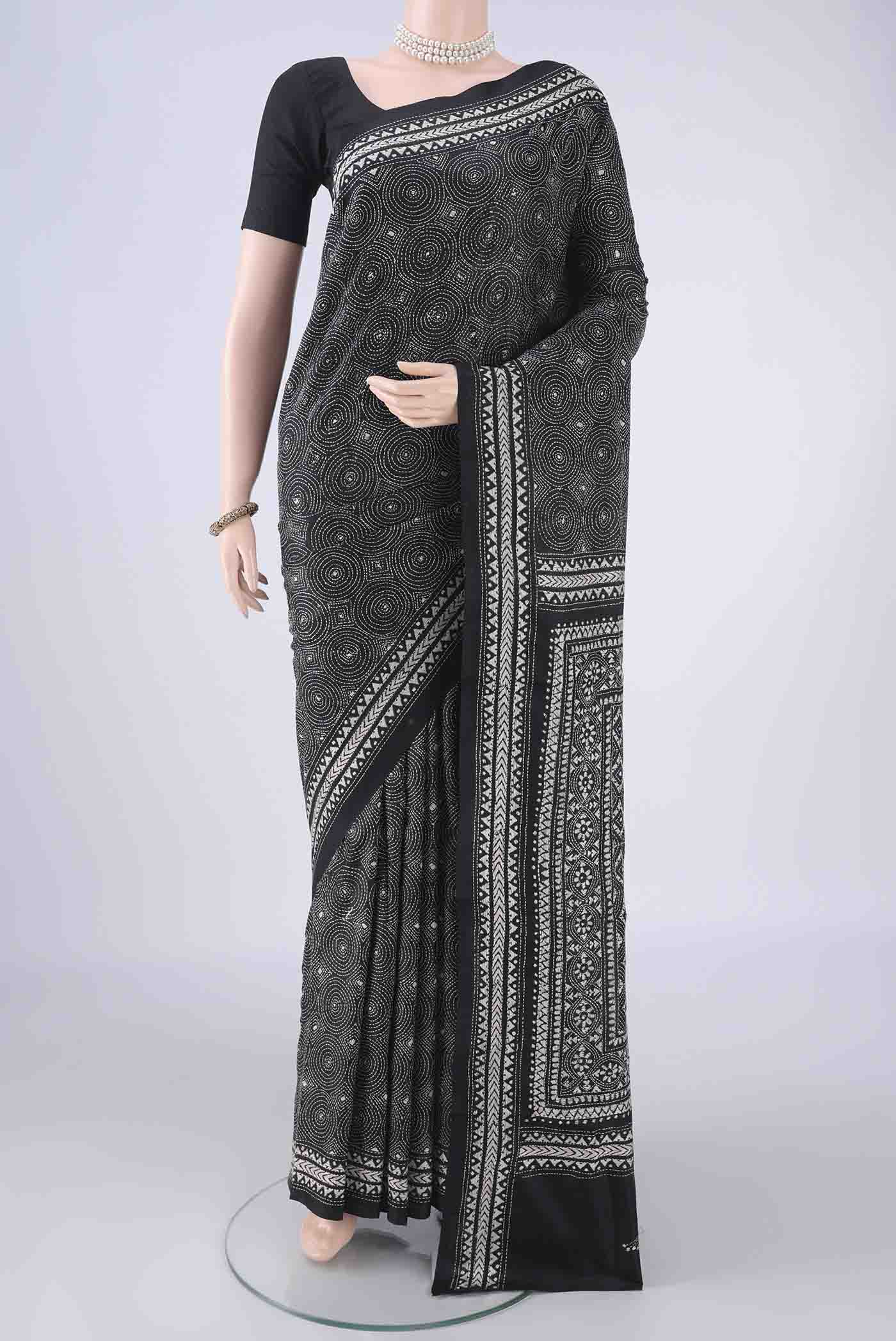 Black Kantha Silk Saree with Kantha Work on the body and Thread Border.  displayed on a mannequin