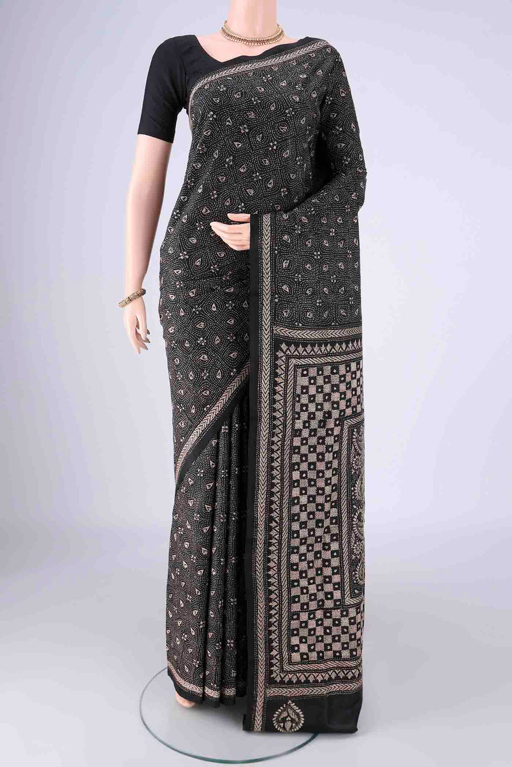 Black Kantha Silk Saree with Kantha Work on the body and Thread Border.  displayed on a mannequin