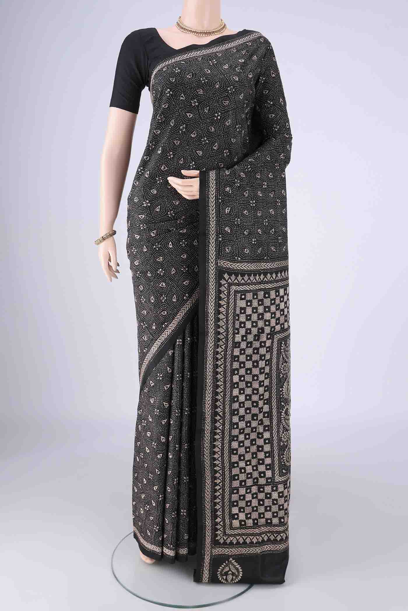 Black Kantha Silk Saree with Kantha Work on the body and Thread Border.  displayed on a mannequin