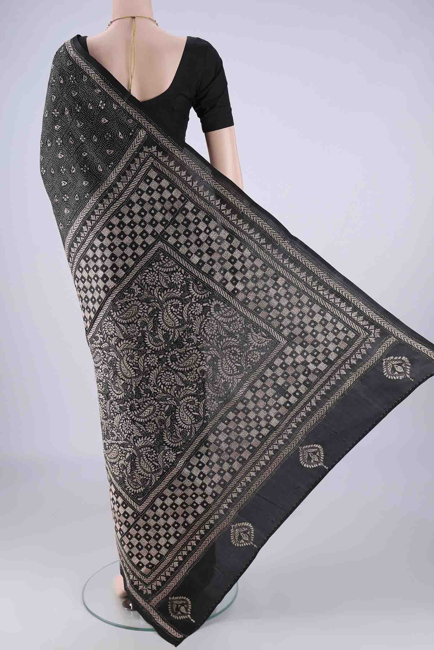 Flat view of Black Kantha Silk Saree with Kantha Work on the body and Thread Border. 