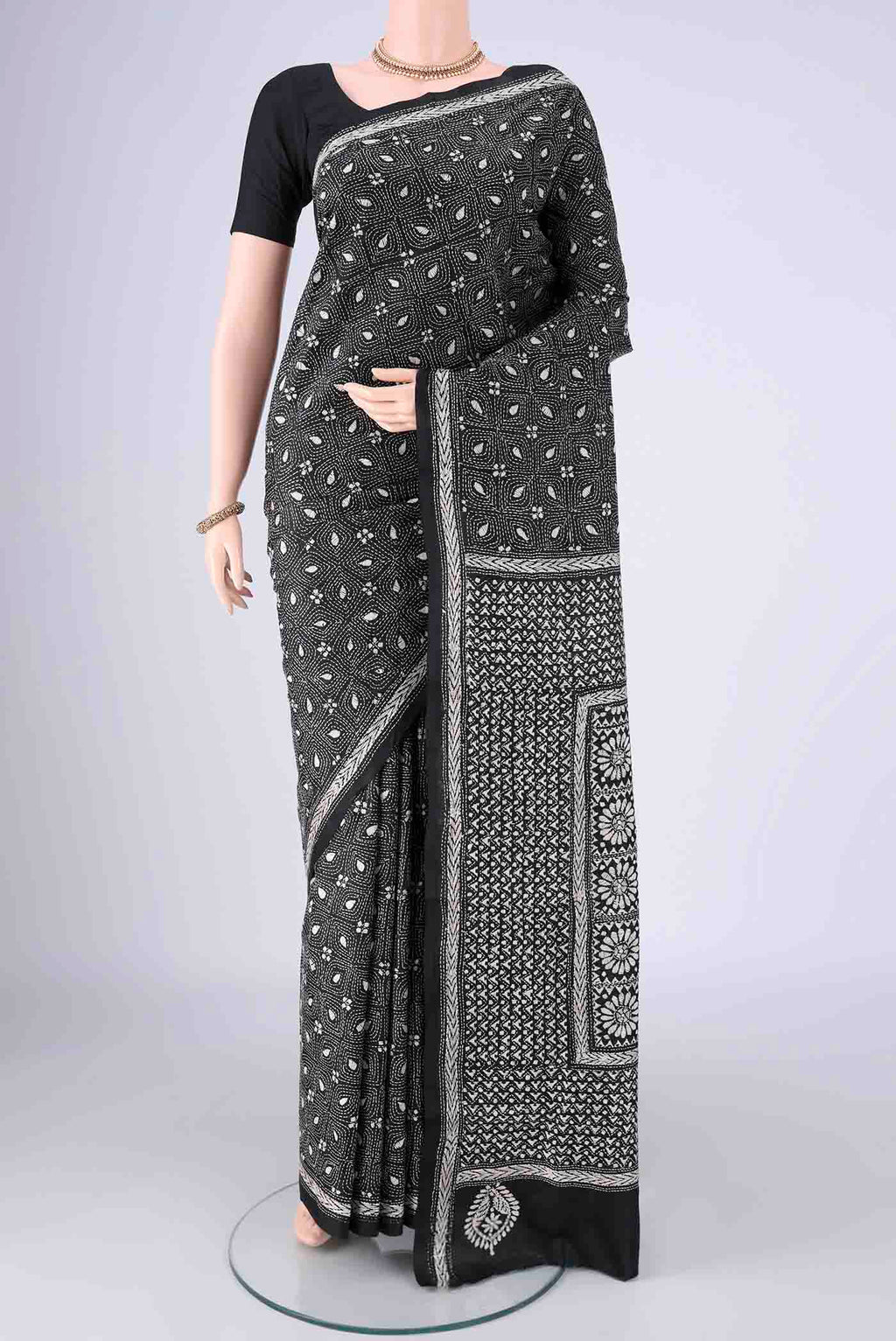Black Kantha Silk Saree with Kantha Work on the body and Thread Border.  displayed on a mannequin