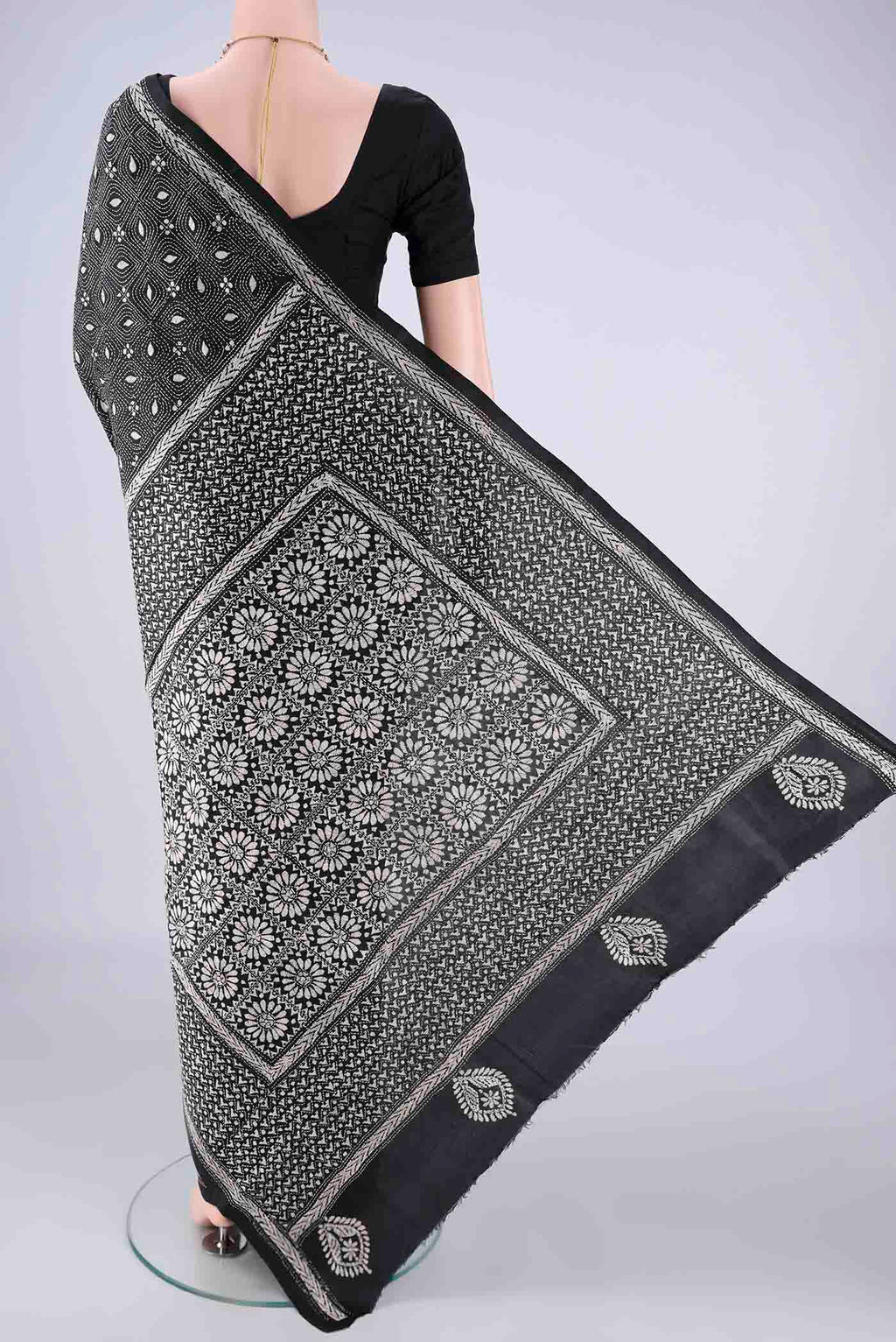Flat view of Black Kantha Silk Saree with Kantha Work on the body and Thread Border. 