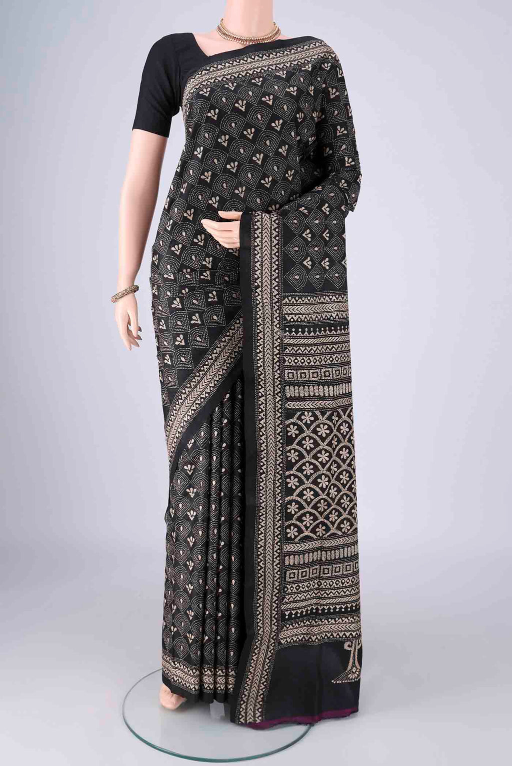 Black Kantha Silk Saree with Kantha Work on the body and Thread Border.  displayed on a mannequin