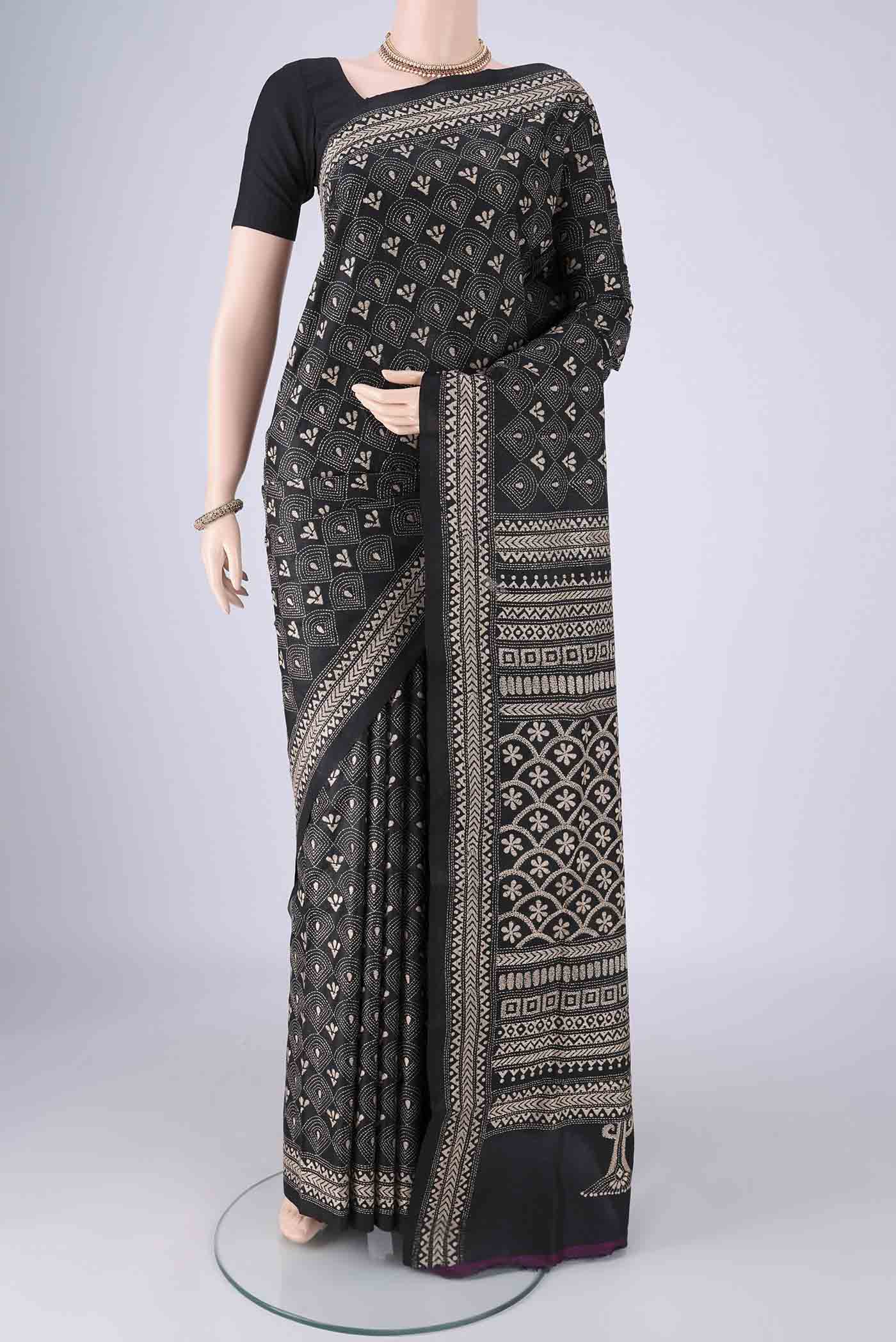 Black Kantha Silk Saree with Kantha Work on the body and Thread Border.  displayed on a mannequin