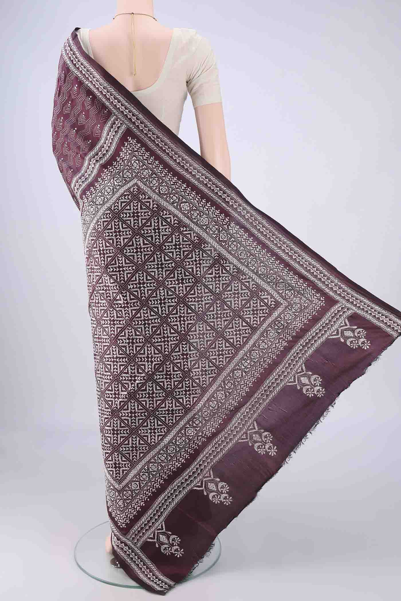 Flat view of Coffee Brown Kantha Silk Saree with Kantha Work on the body and Thread Border. 