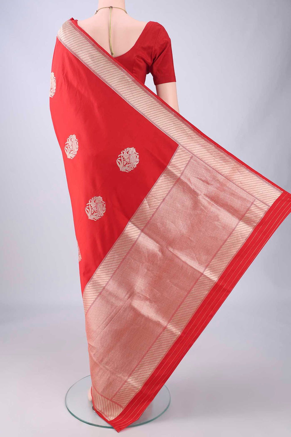 Flat view of Red Banarasi Silk Saree with Zari Butta on the body and Zari Border. 