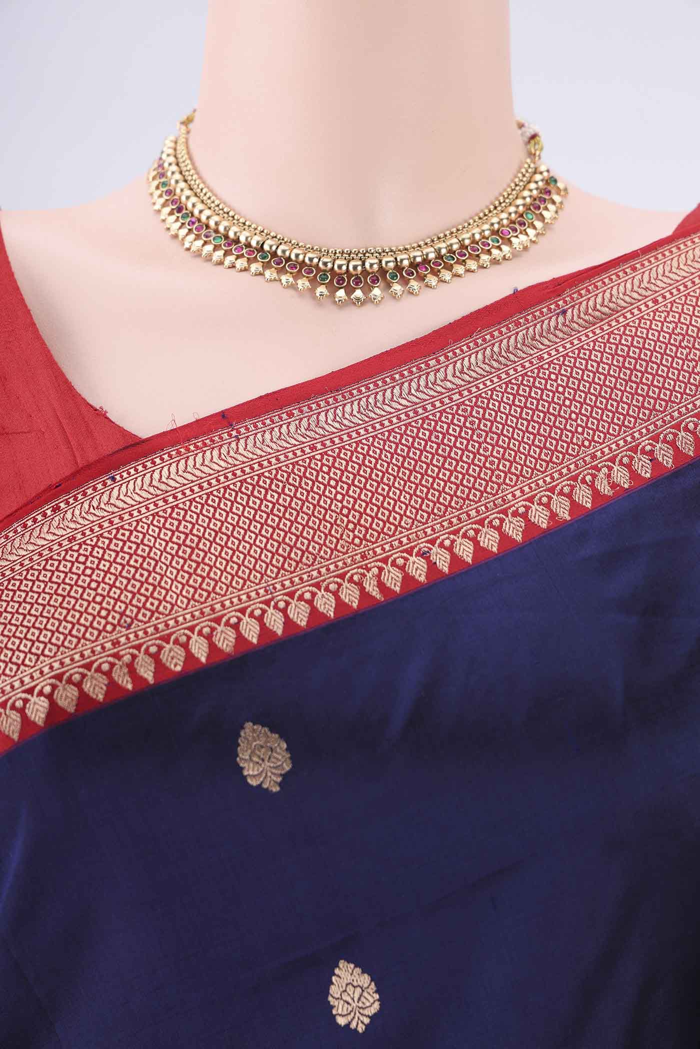 Border image of Navy Blue Dual Tone Banarasi Katan Silk Saree with Zari Butta on the body and Zari Border. 