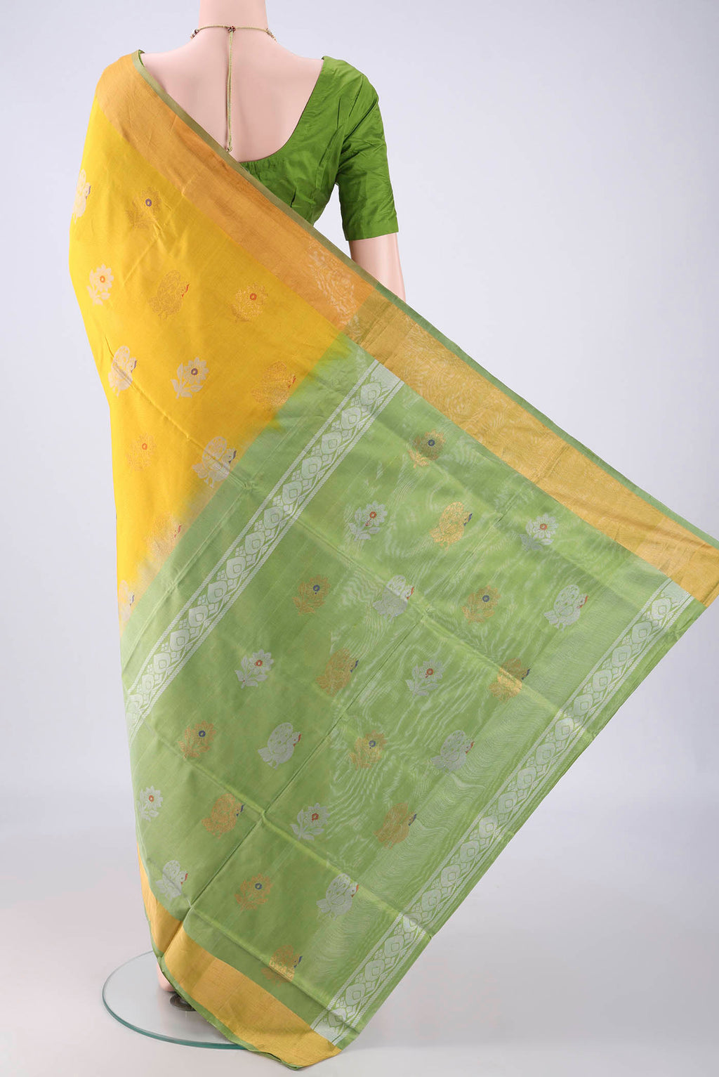 Flat view of Yellow Uppada Silk Saree with Zari Butta on the body and Zari Border. 