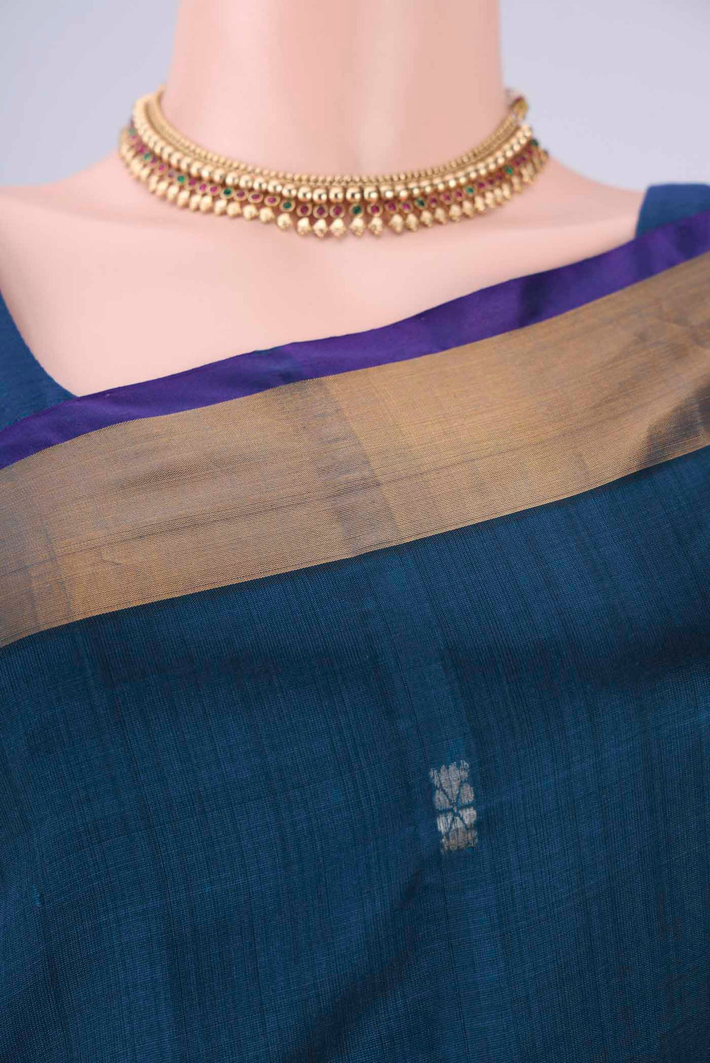 Border image of Turquoise Uppada Silk Saree with Zari Butta on the body and Zari Border. 