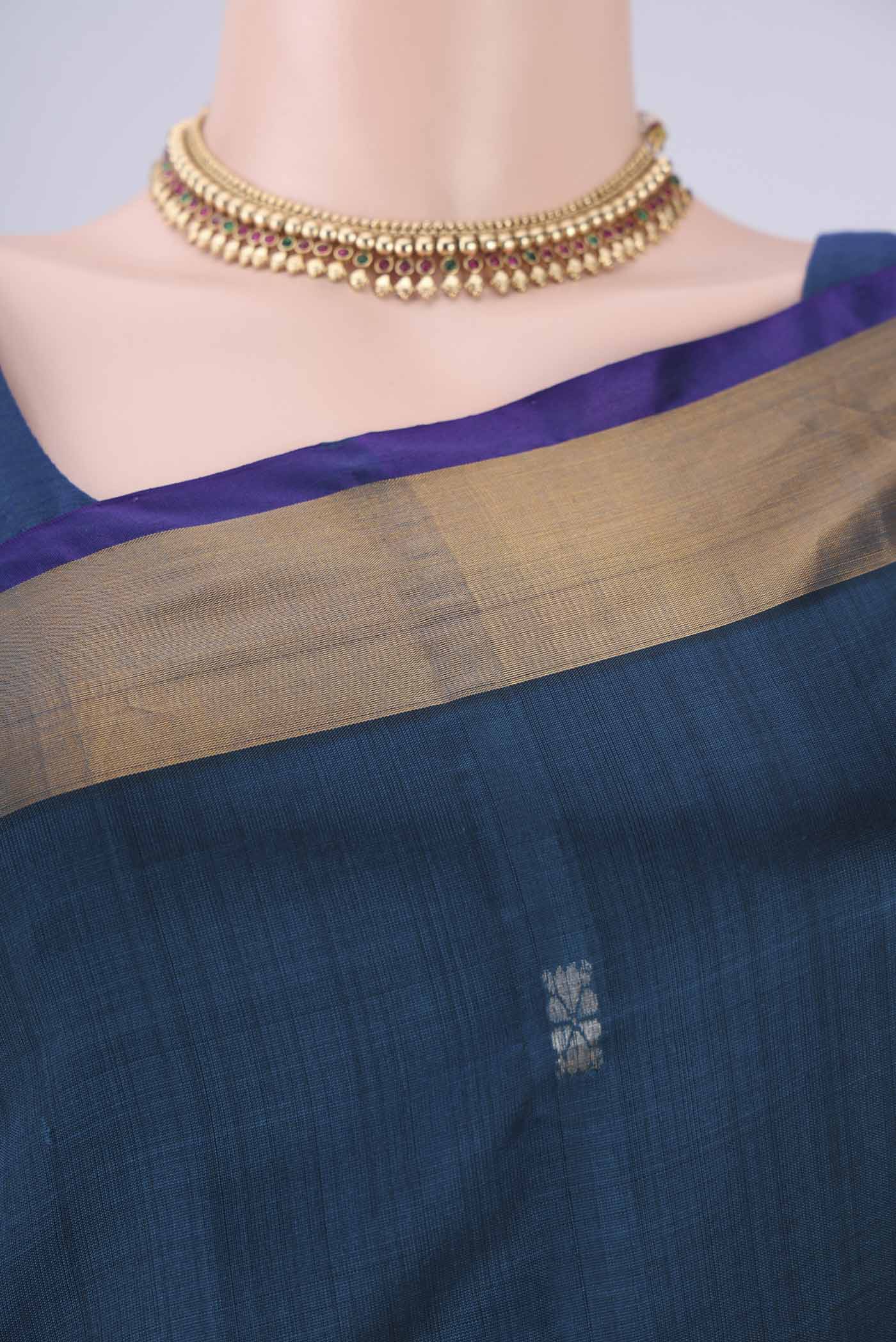 Border image of Turquoise Uppada Silk Saree with Zari Butta on the body and Zari Border. 