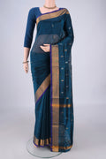 Turquoise Uppada Silk Saree with Zari Butta on the body and Zari Border.  displayed on a mannequin