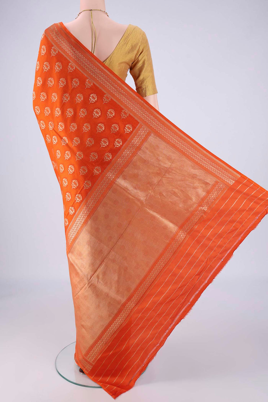 Flat view of Rust Banarasi Silk Saree with Jacquard With Zari Butta on the body and Zari Border. 