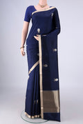 Navy Blue Banarasi Silk Saree with Zari Butta on the body and Zari Border.  displayed on a mannequin
