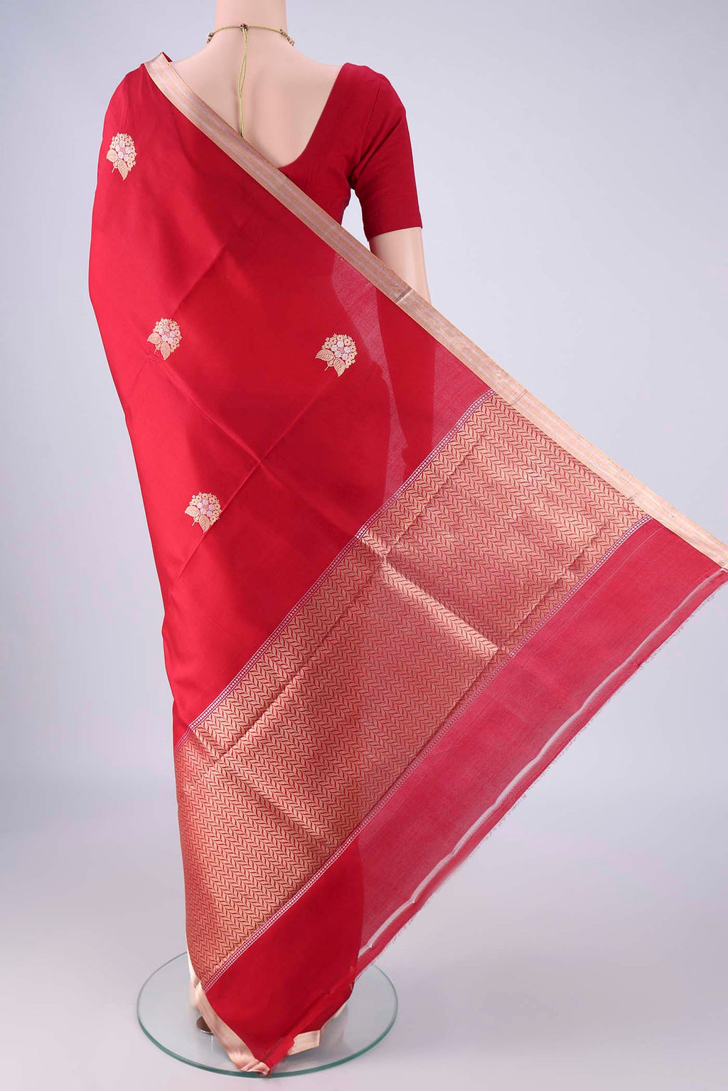 Flat view of Red Banarasi Silk Saree with Zari Butta on the body and Zari Border. 
