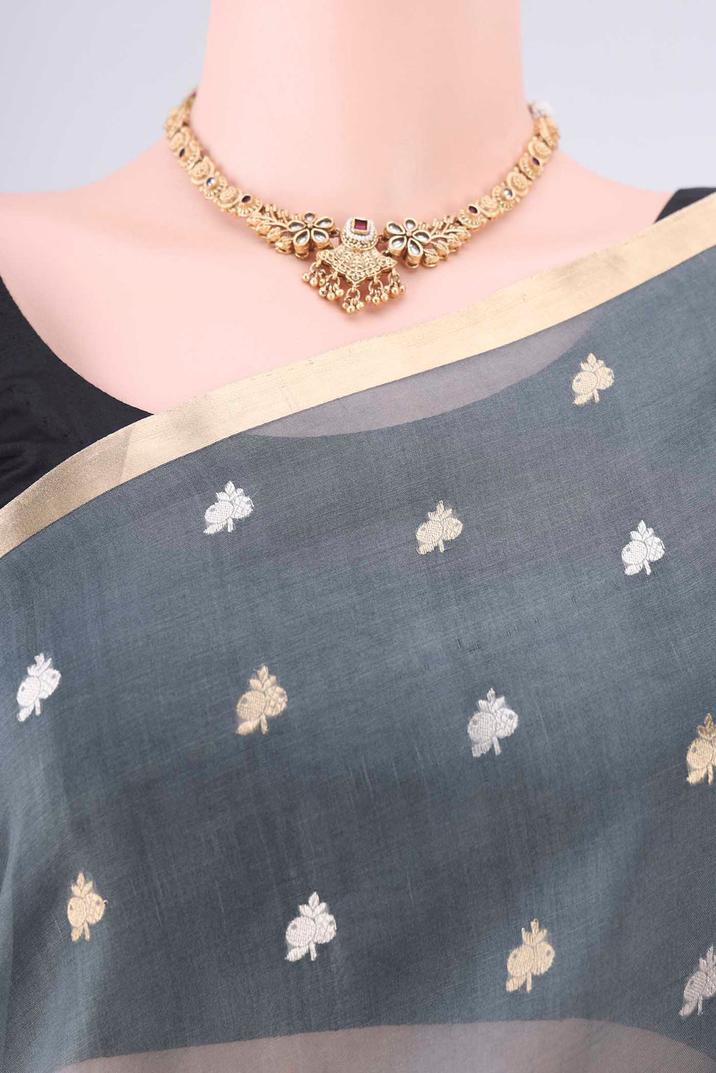 Border image of Grey Organza Saree with Half And Half on the body and Zari Border. 