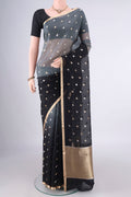 Grey Organza Saree with Half And Half on the body and Zari Border.  displayed on a mannequin