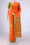 Orange Kanchipuram Silk Saree with Zari Butta on the body and One Side Border.  displayed on a mannequin
