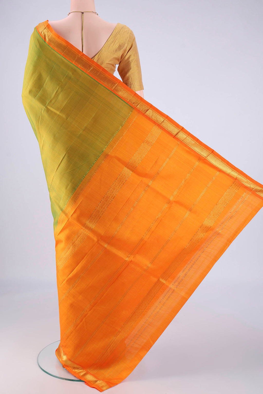 Flat view of Light Green Kanjivaram Silk Saree with Plain Body and Zari Border. 