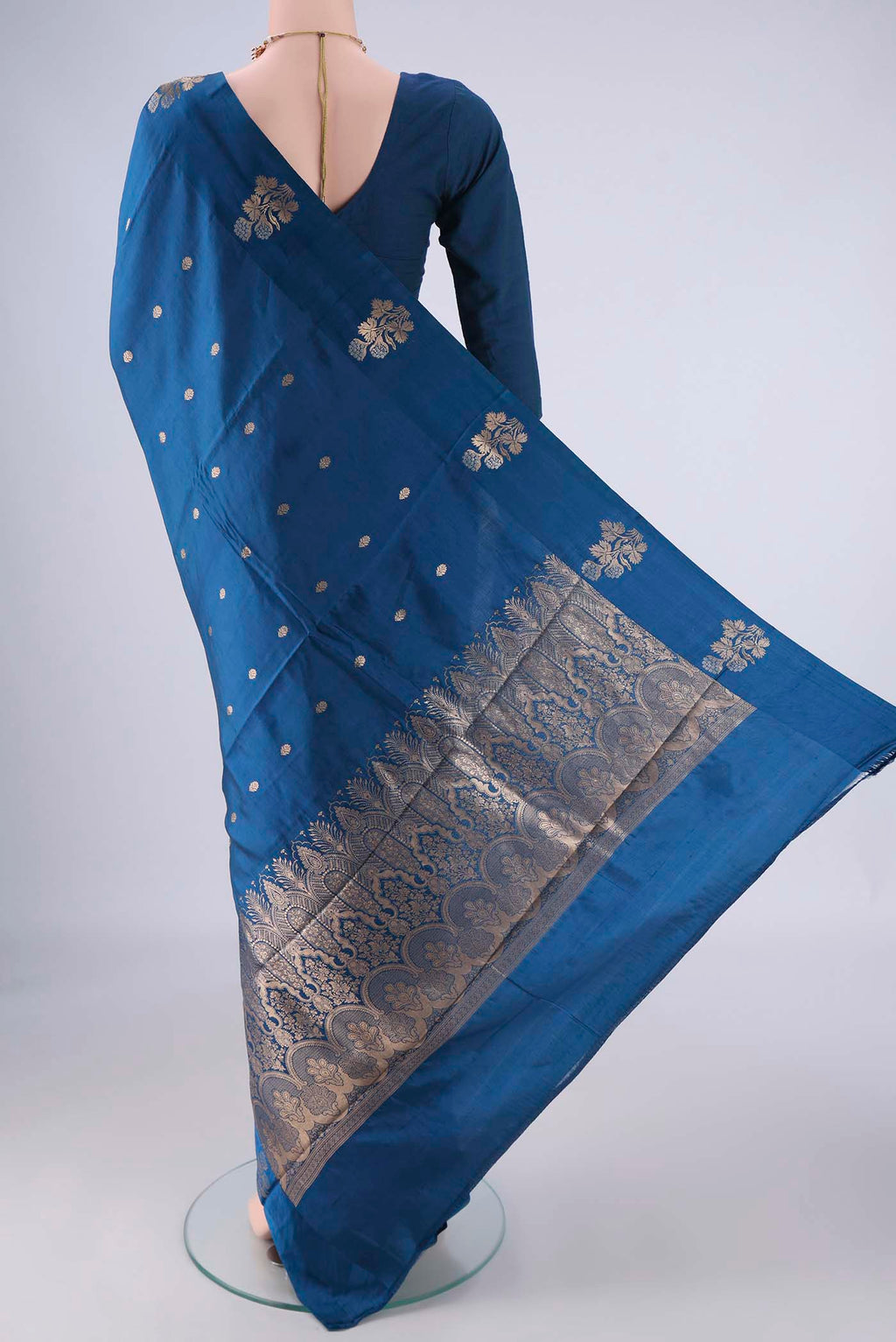 Flat view of Royal Blue Banarasi Katan Silk Saree with Zari Butta on the body and Satin Border. 