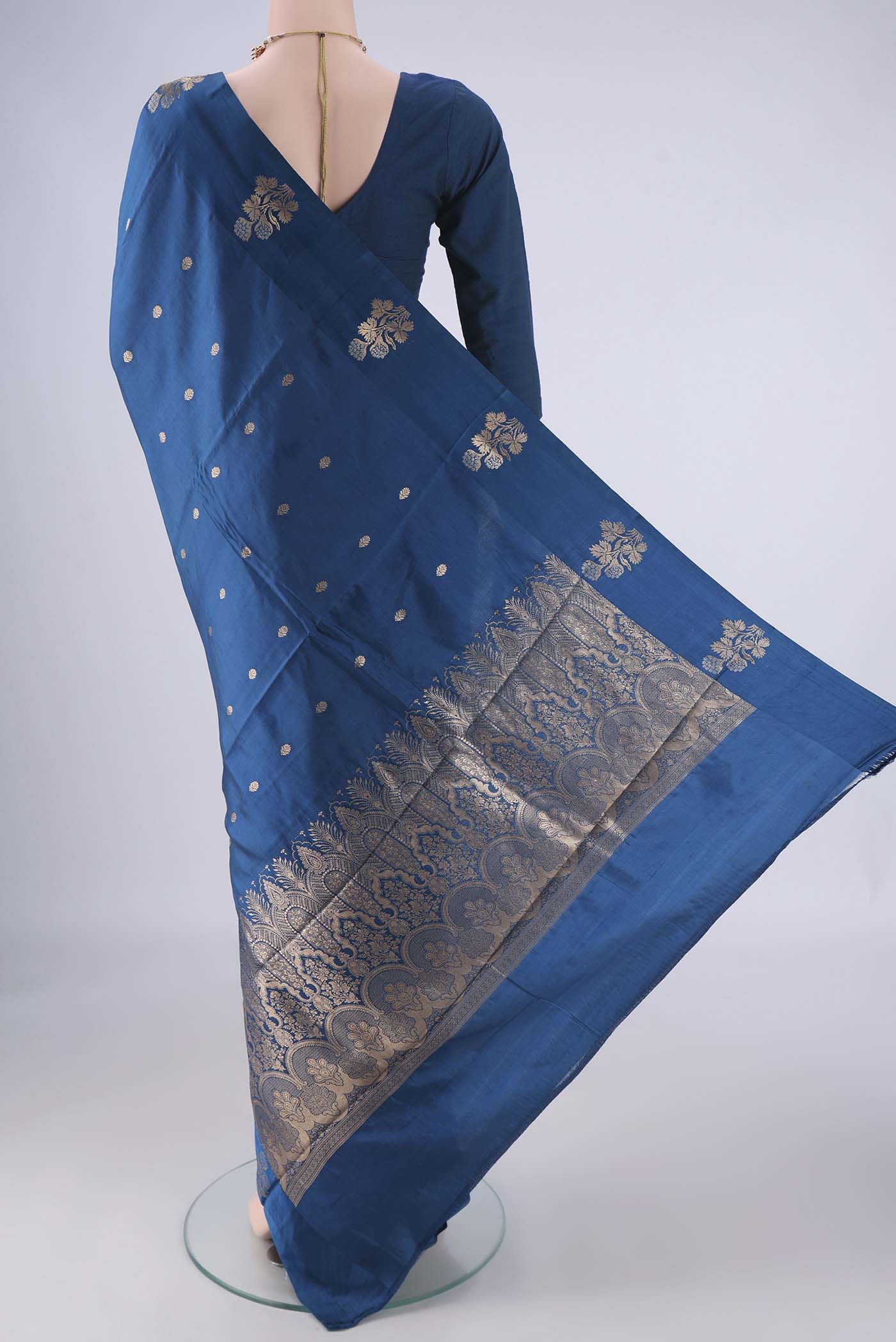 Flat view of Royal Blue Banarasi Katan Silk Saree with Zari Butta on the body and Satin Border. 