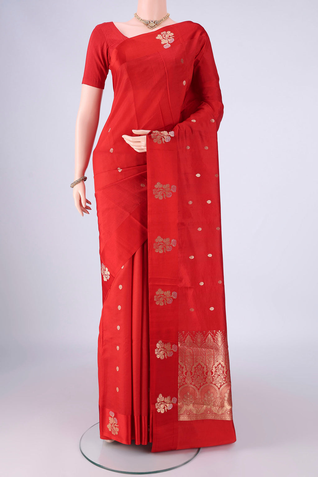 Red Banarasi Katan Silk Saree with Zari Butta on the body and Satin Border.  displayed on a mannequin