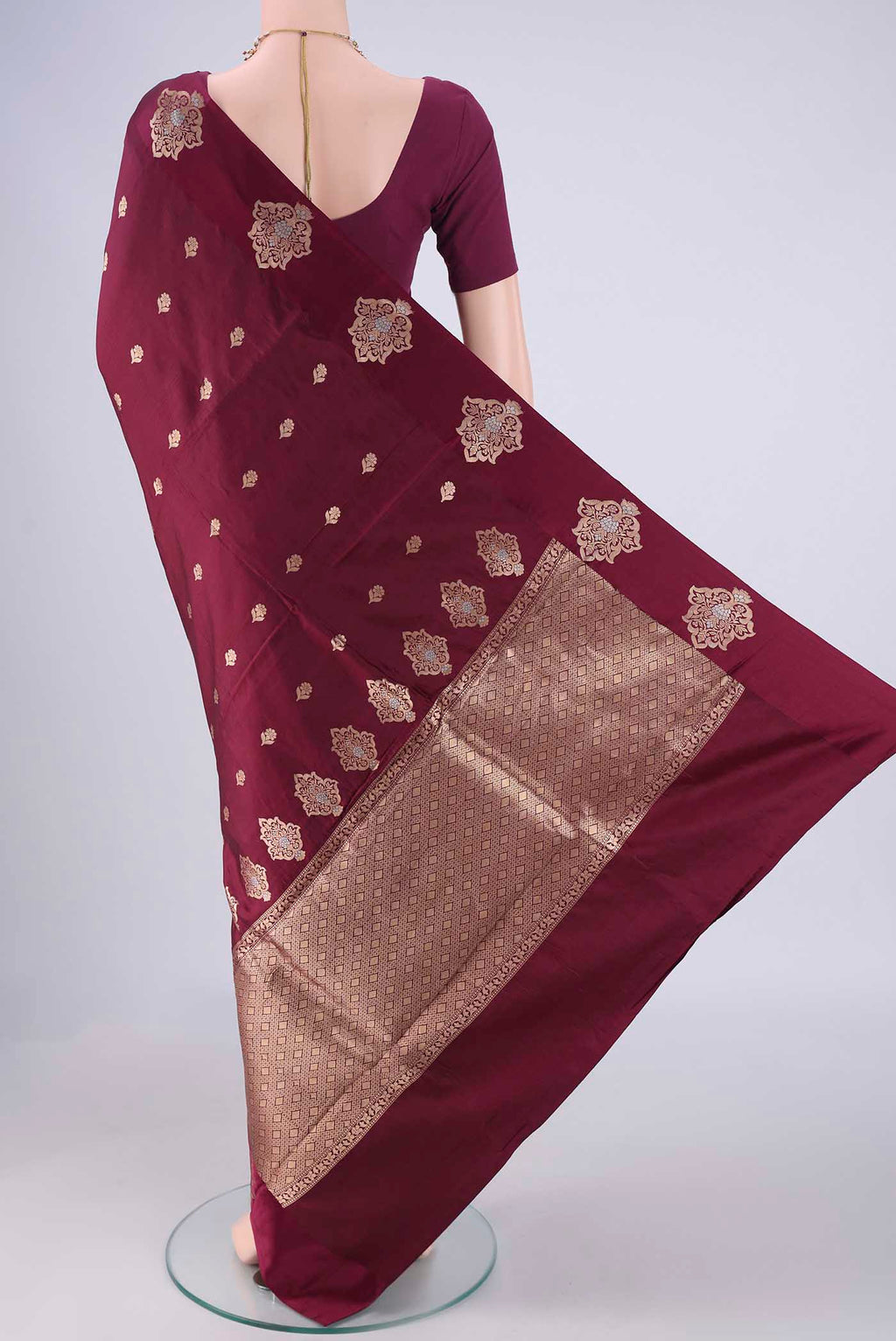 Flat view of Coffee Brown Banarasi Katan Silk Saree with Zari Butta on the body and Satin Border. 