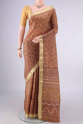 Pure Silk Brown Printed Saree with Printed design on the body and Zari Border.  displayed on a mannequin