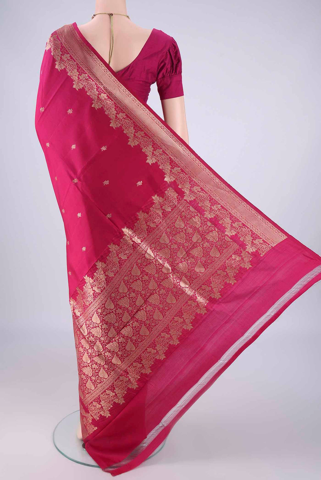 Flat view of Pink Banarasi Katan Silk Saree with Zari Butta on the body and Zari Border. 