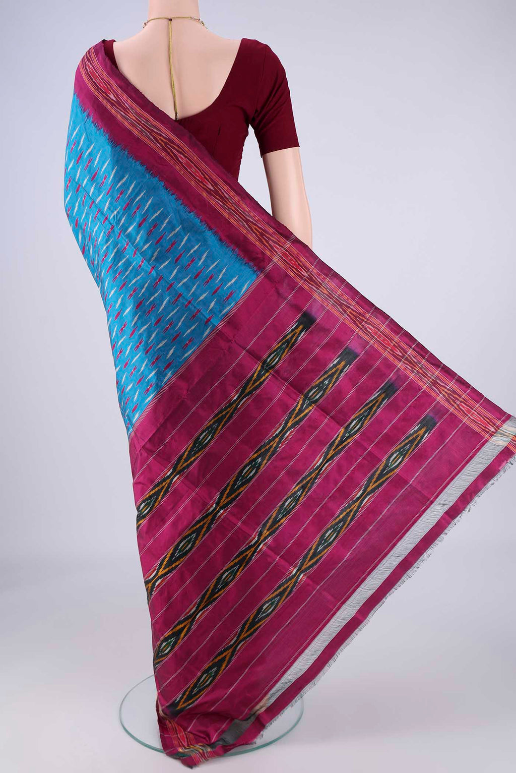 Flat view of Blue Pochampally Silk Saree with Pure Ikat on the body and Ikat Border. 