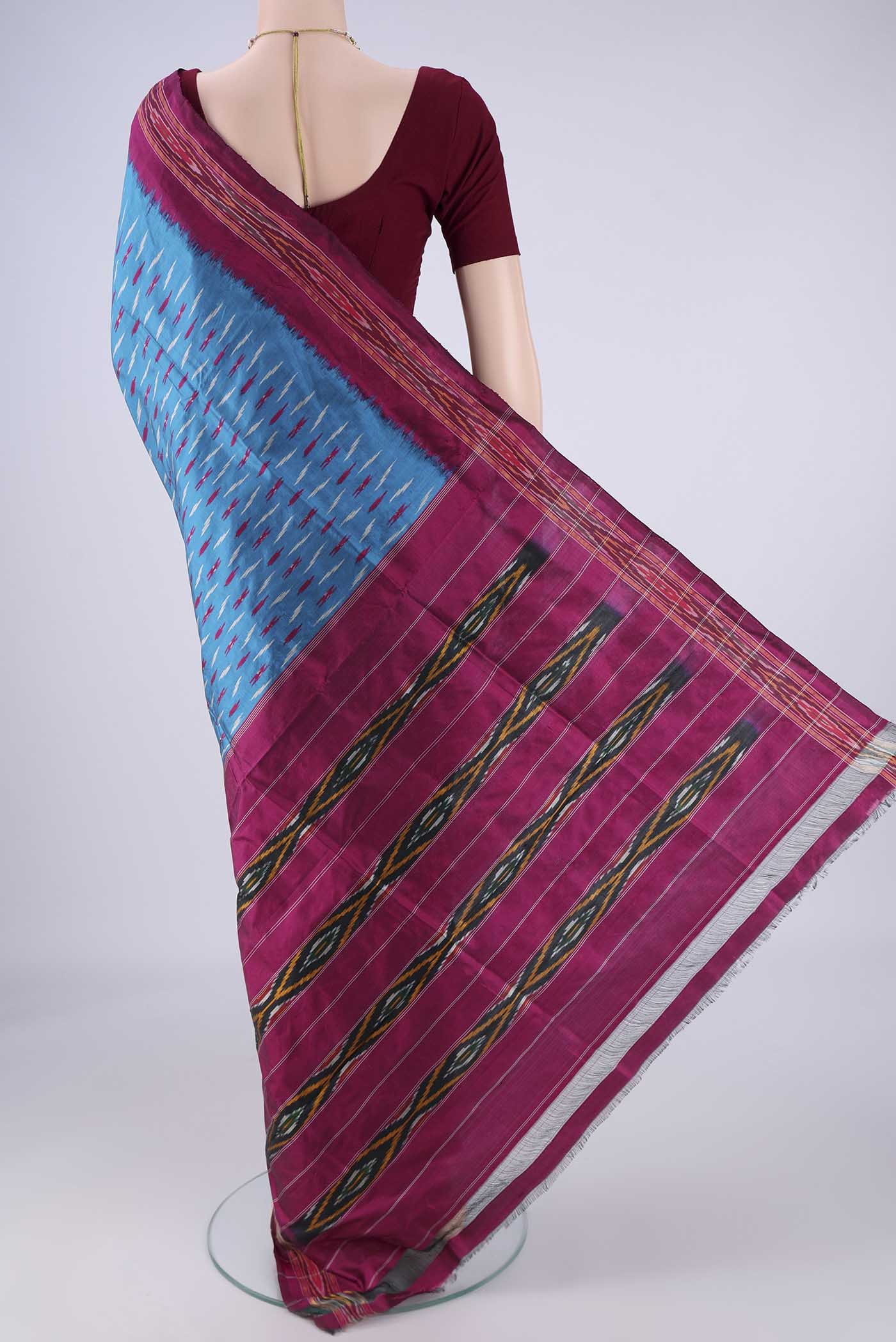 Flat view of Blue Pochampally Silk Saree with Pure Ikat on the body and Ikat Border. 