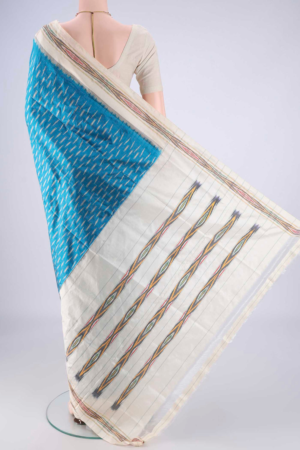 Flat view of Blue Pochampally Silk Saree with Pure Ikat on the body and Ikat Border. 