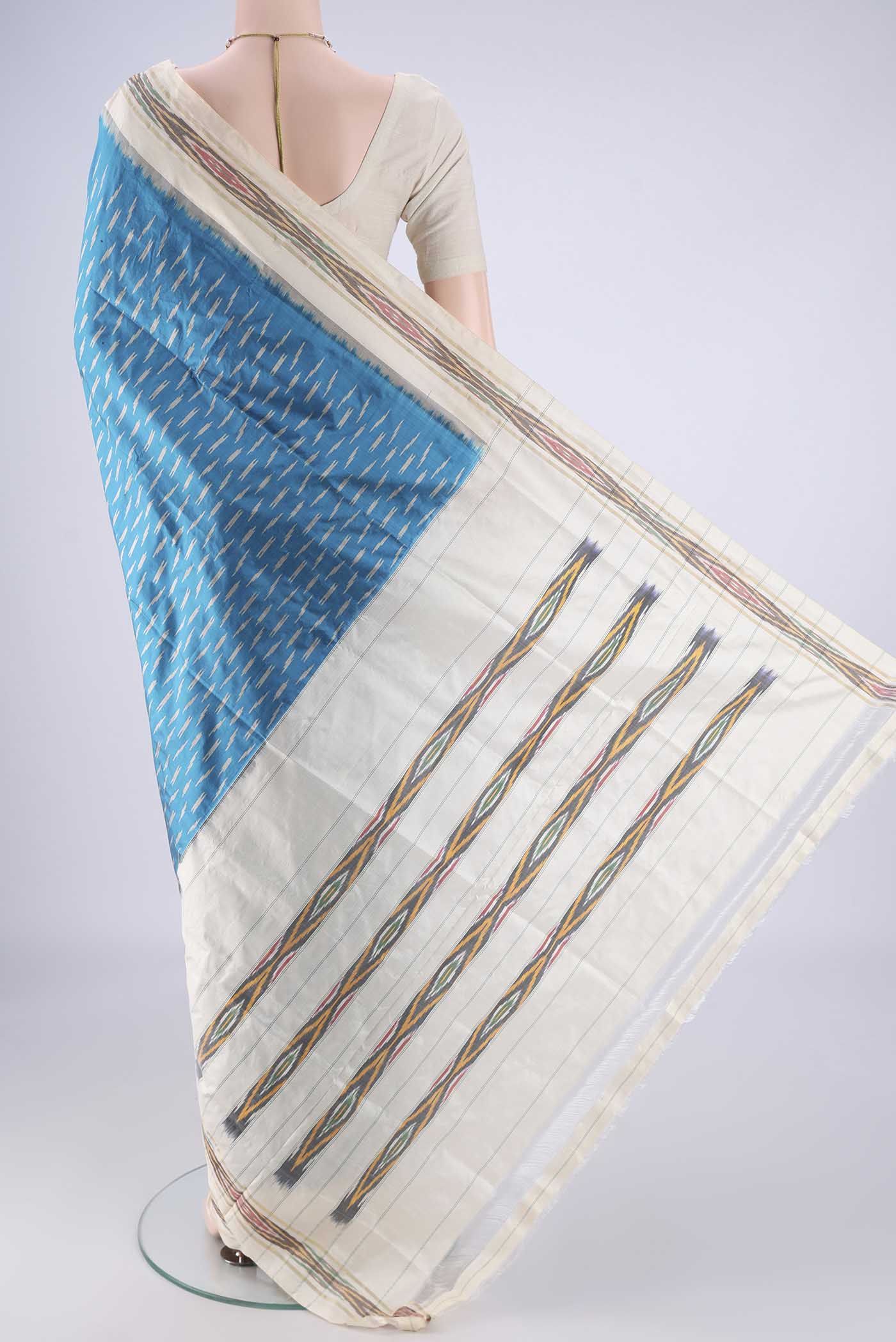 Flat view of Blue Pochampally Silk Saree with Pure Ikat on the body and Ikat Border. 
