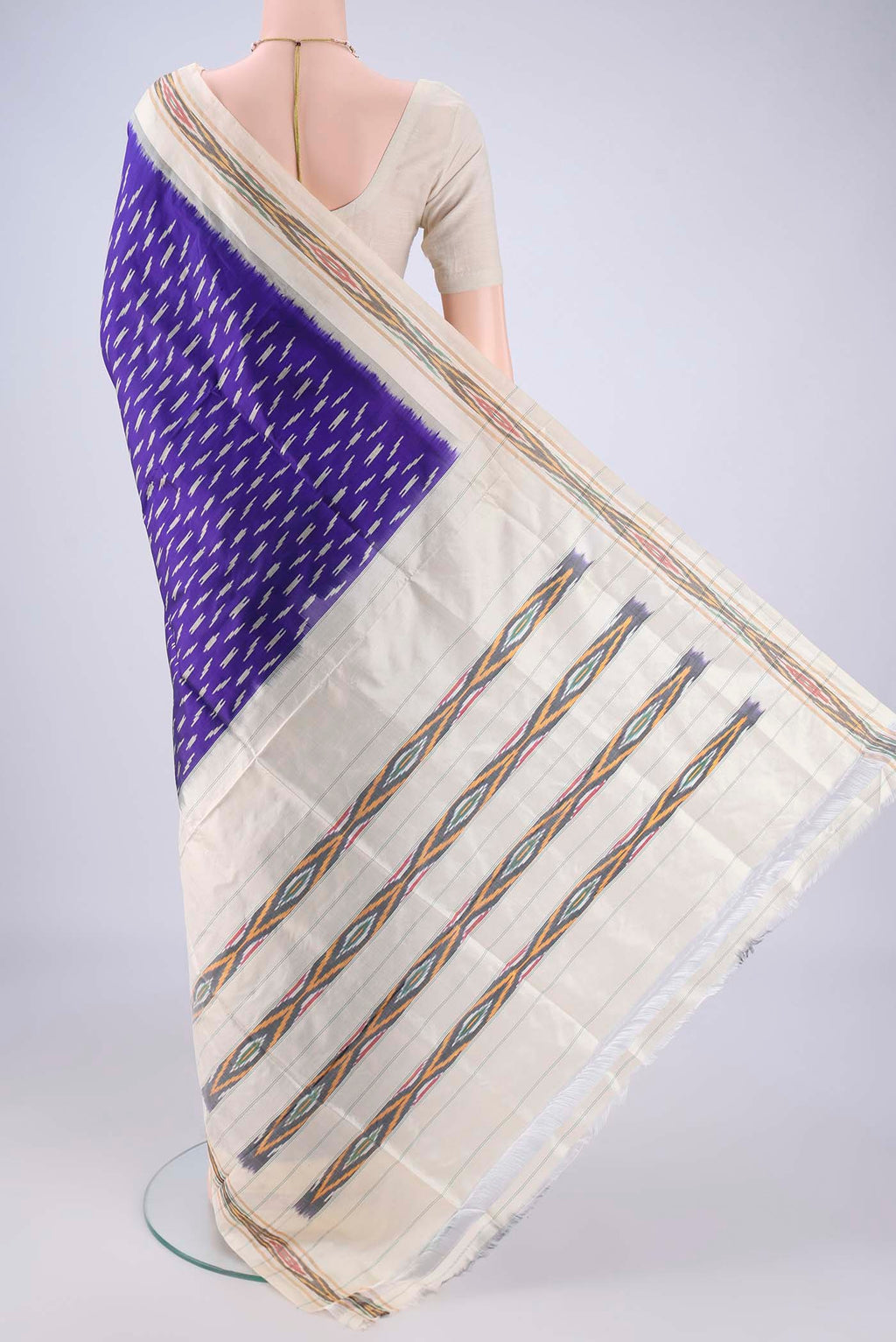 Flat view of Dark Blue Pochampally Silk Saree with Pure Ikat on the body and Ikat Border. 