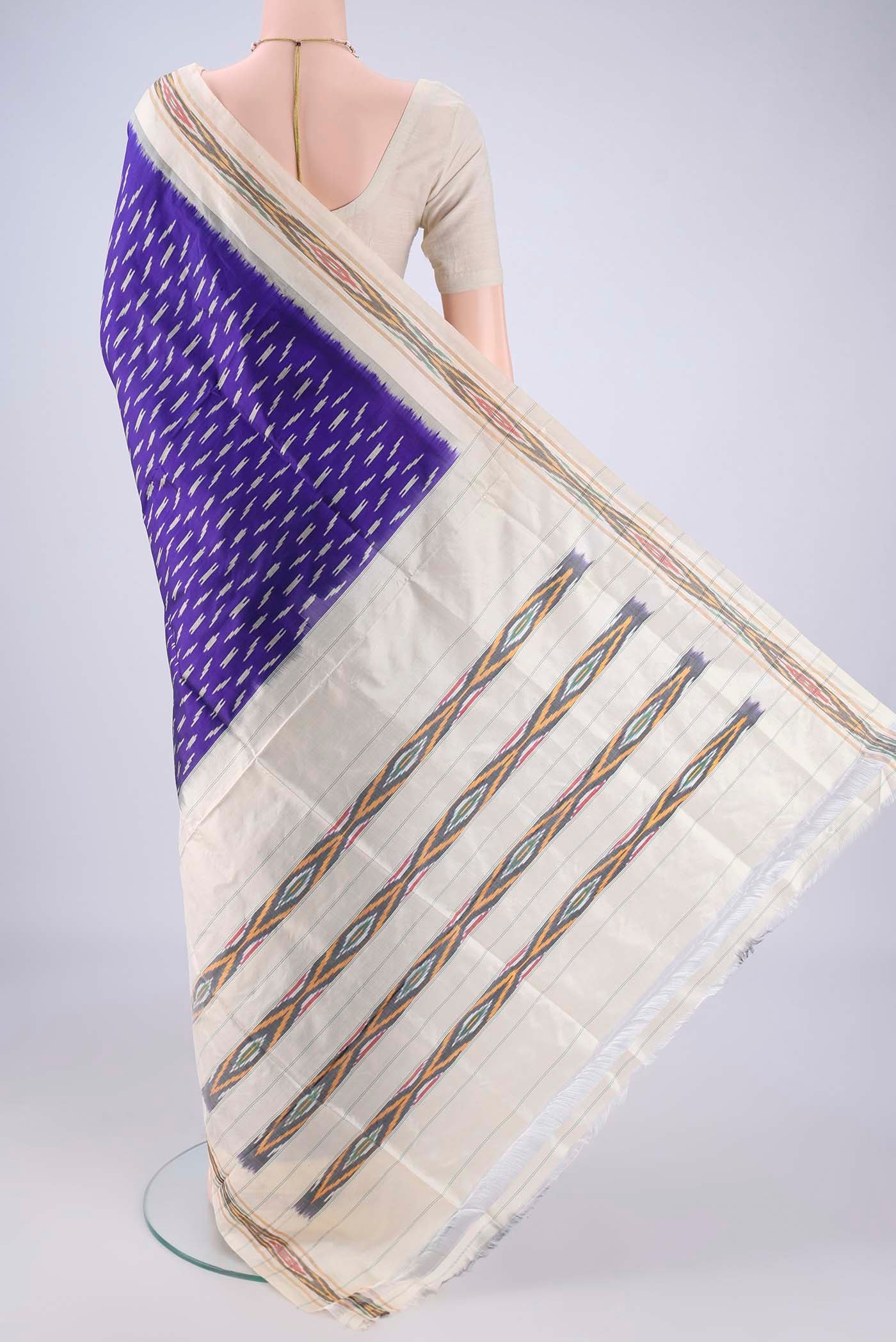 Flat view of Dark Blue Pochampally Silk Saree with Pure Ikat on the body and Ikat Border. 