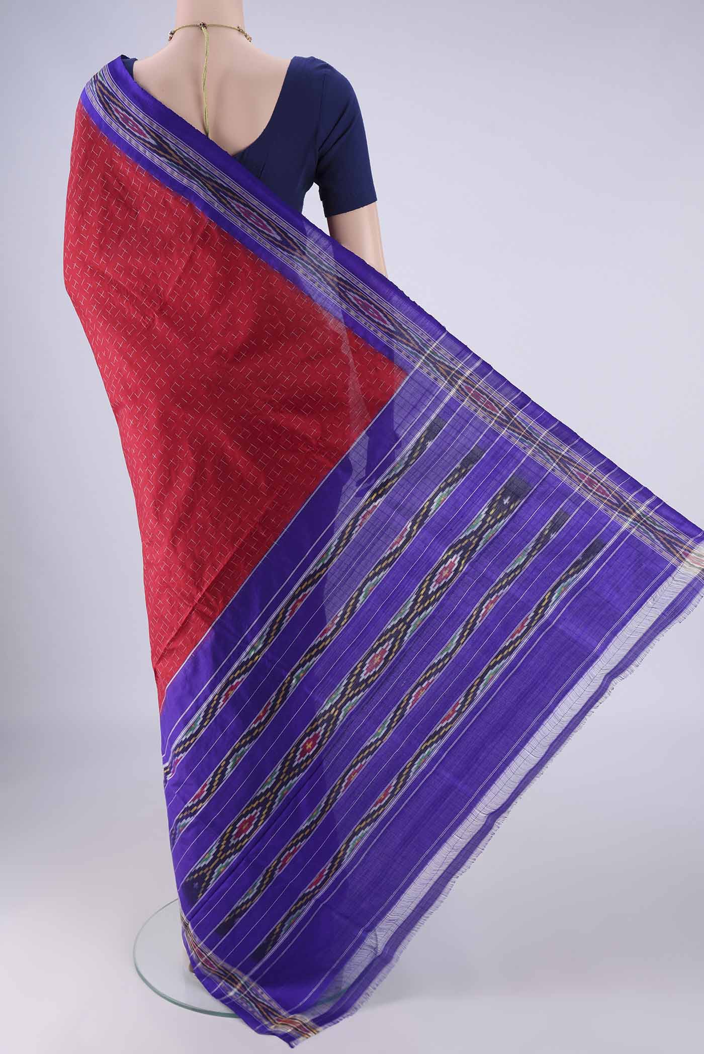 Flat view of Maroon Pochampally Silk Saree with Pure Ikat on the body and Ikat Border. 