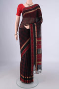 Black Blended Kanchi Cotton Saree with Checked design on the body and Zari Border.  displayed on a mannequin