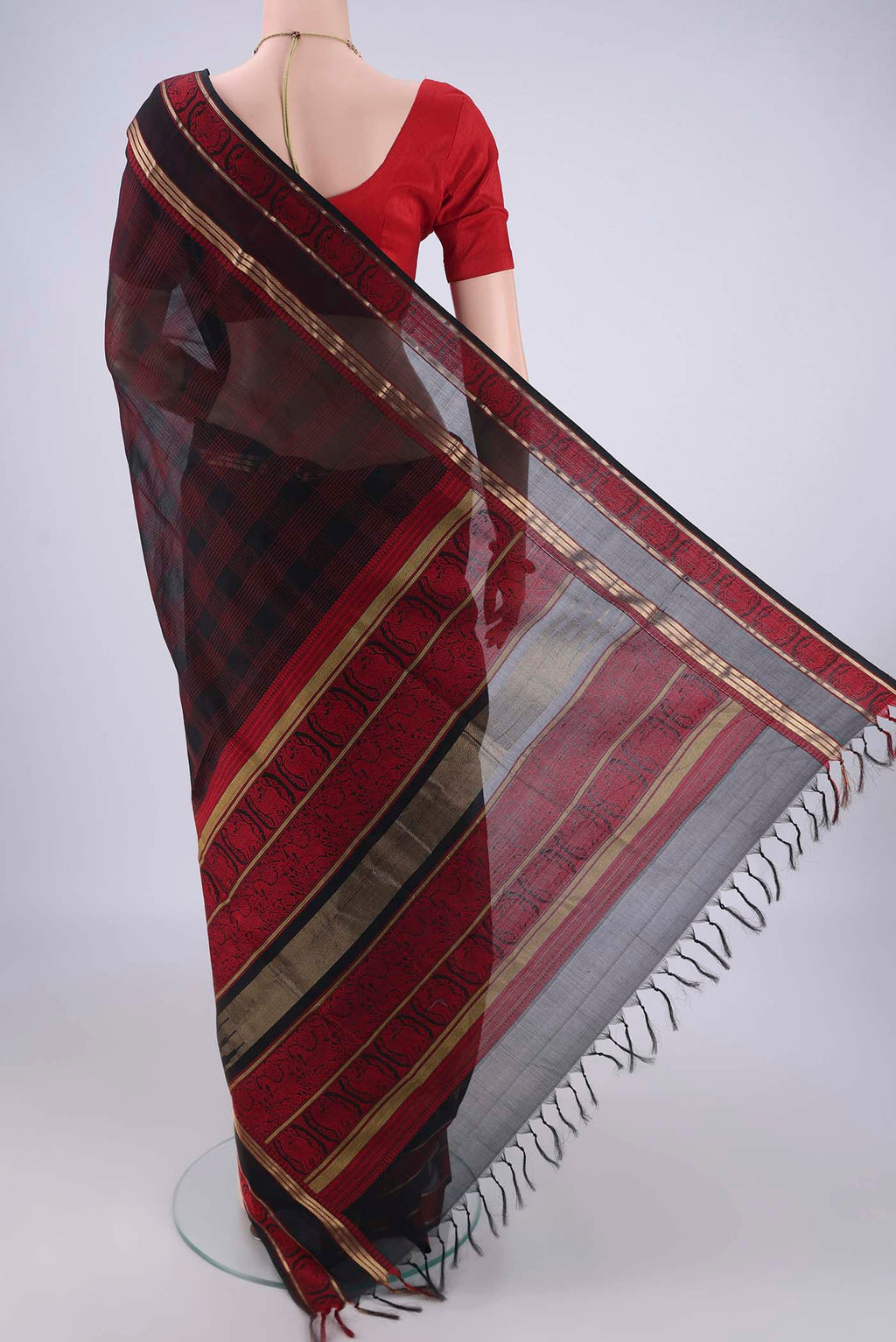 Flat view of Black Blended Kanchi Cotton Saree with Checked design on the body and Zari Border. 