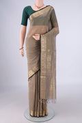 Davys Grey Kanchi Cotton Saree with Zari Butta on the body and Zari Border.  displayed on a mannequin