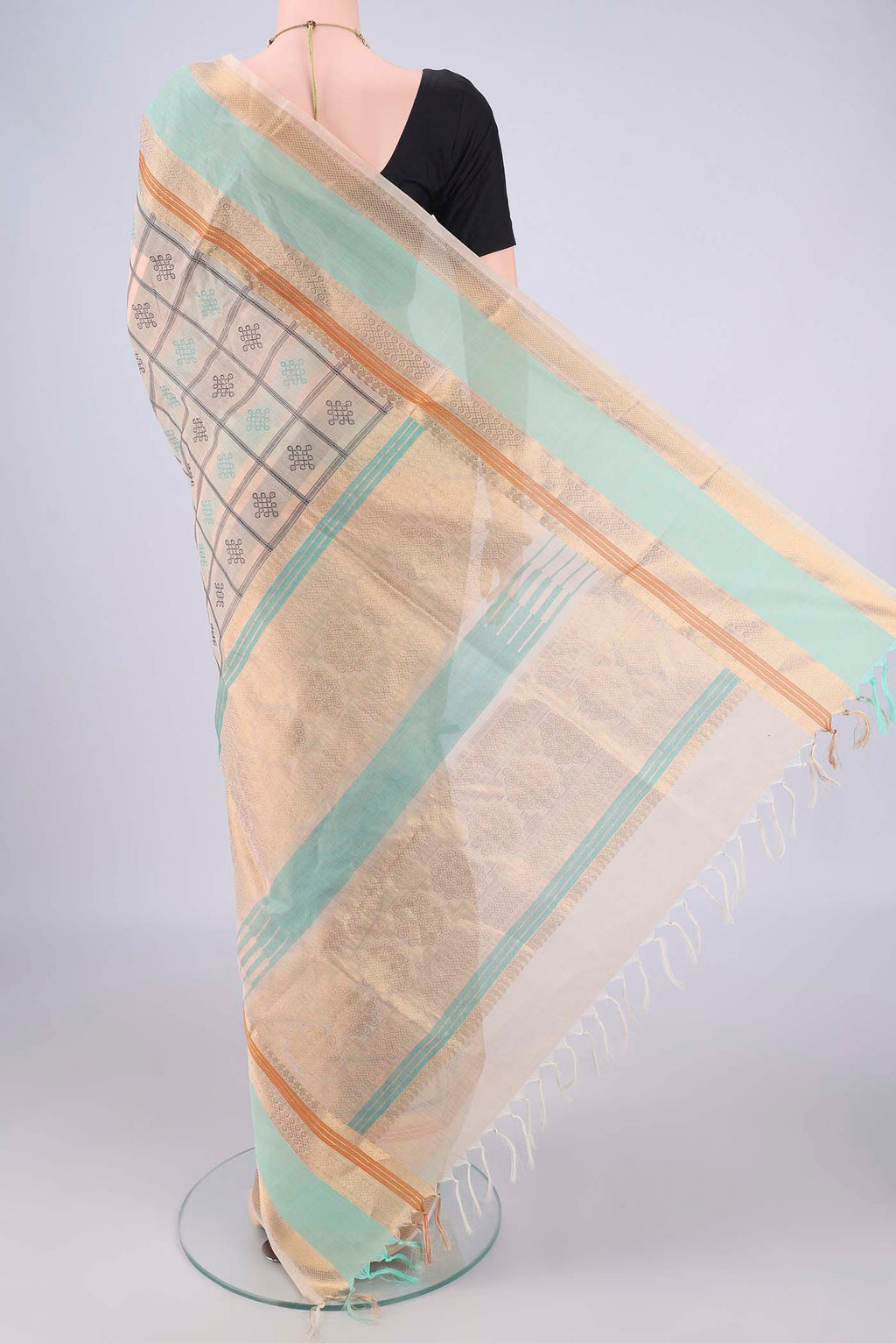 Flat view of Beige Coimbatore Silk Cotton Saree with Checked design on the body and Zari Border. 