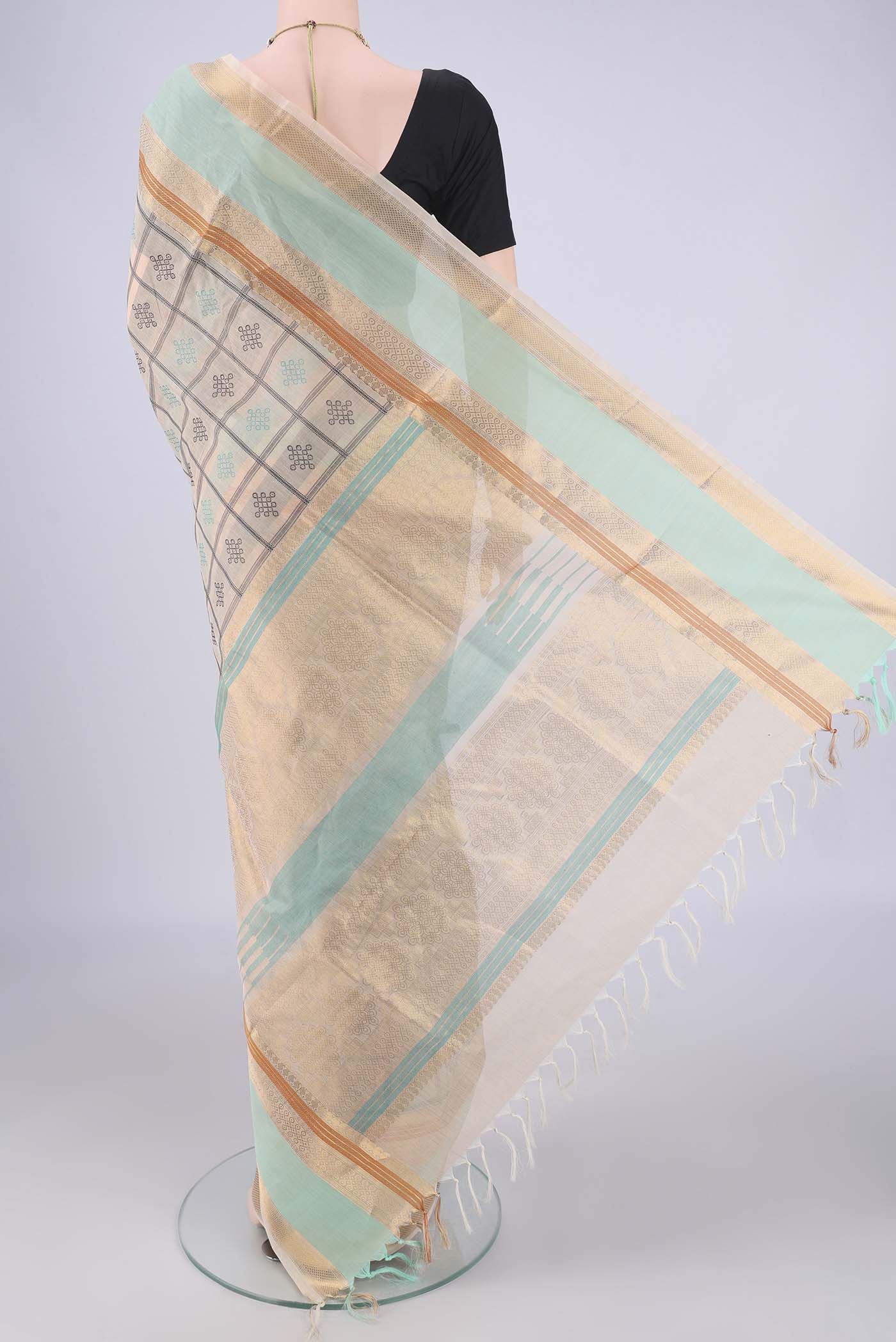 Flat view of Beige Coimbatore Silk Cotton Saree with Checked design on the body and Zari Border. 
