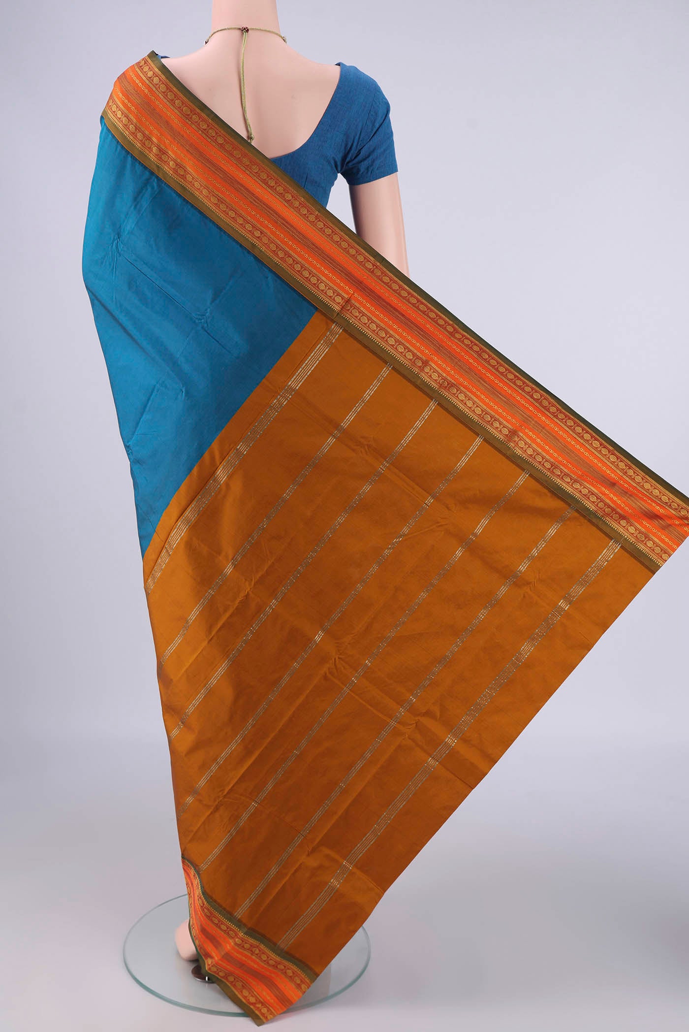 Flat view of Blue Blended Bangalore Silk Saree with Plain Body and Zari Border. 