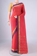 Coral Blended Bangalore Silk Saree with Plain Body and Zari Border.  displayed on a mannequin