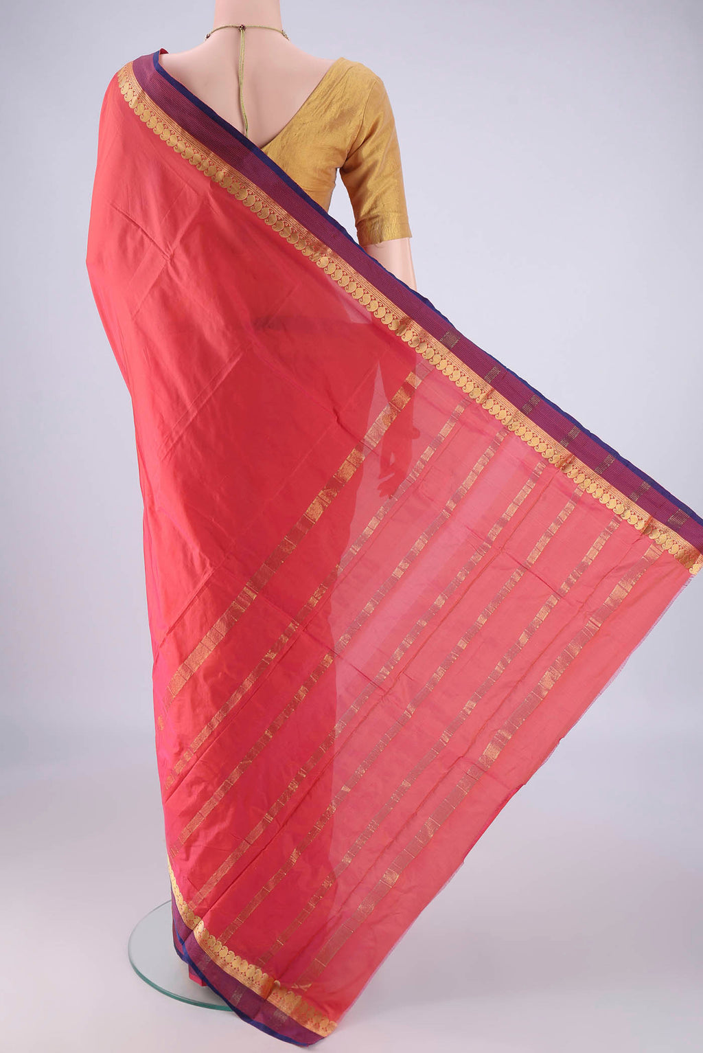 Flat view of Coral Blended Bangalore Silk Saree with Plain Body and Zari Border. 