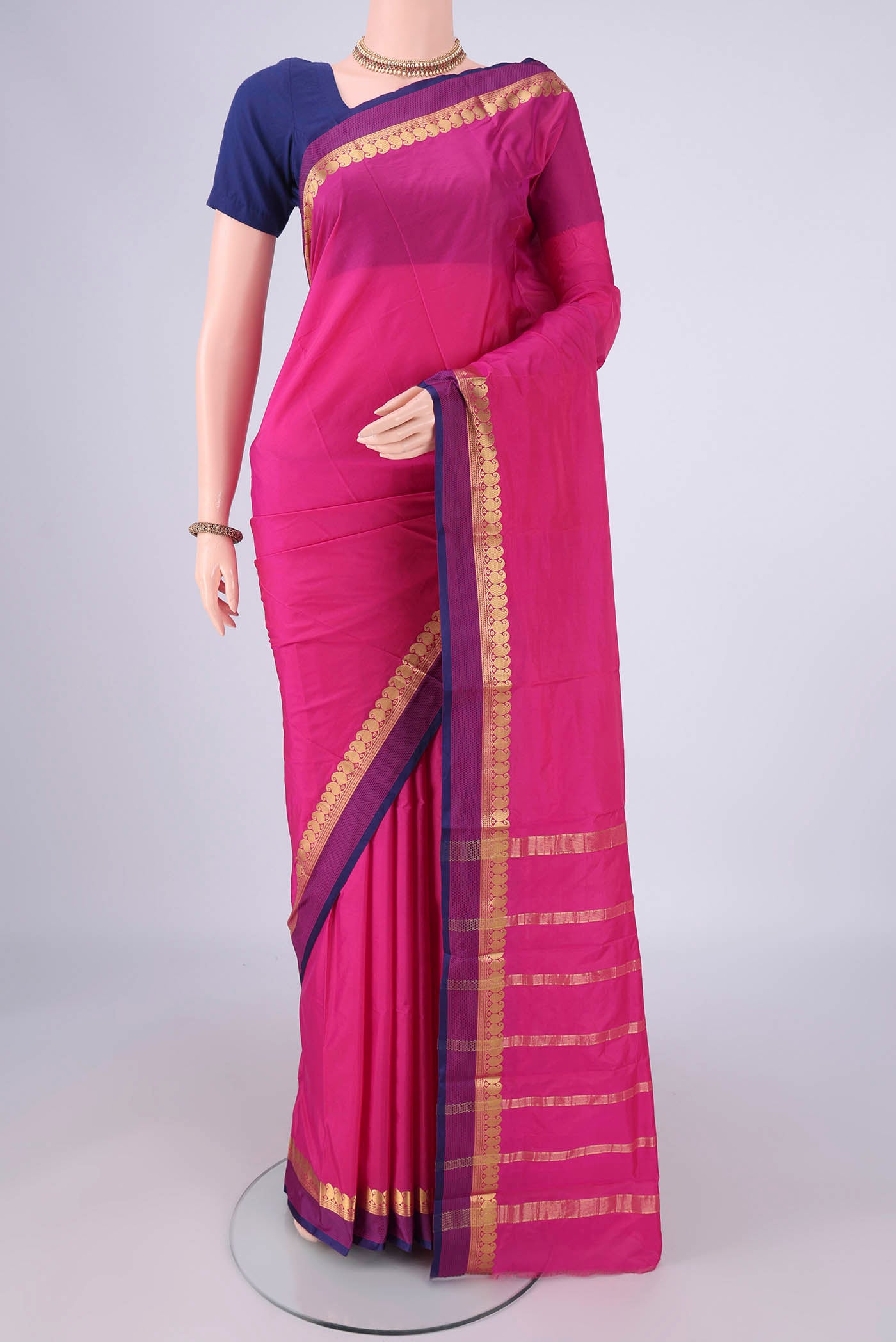 Pink Blended Bangalore Silk Saree with Plain Body and Zari Border.  displayed on a mannequin