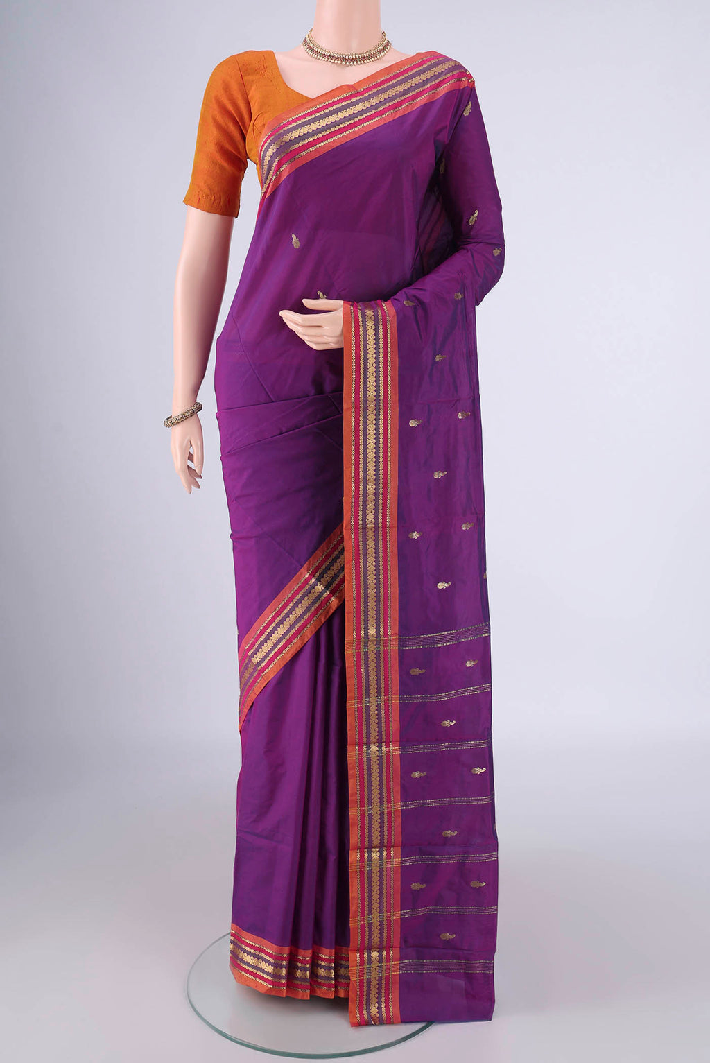 Purple Blended Bangalore Silk Saree with Zari Butta on the body and Zari Border.  displayed on a mannequin