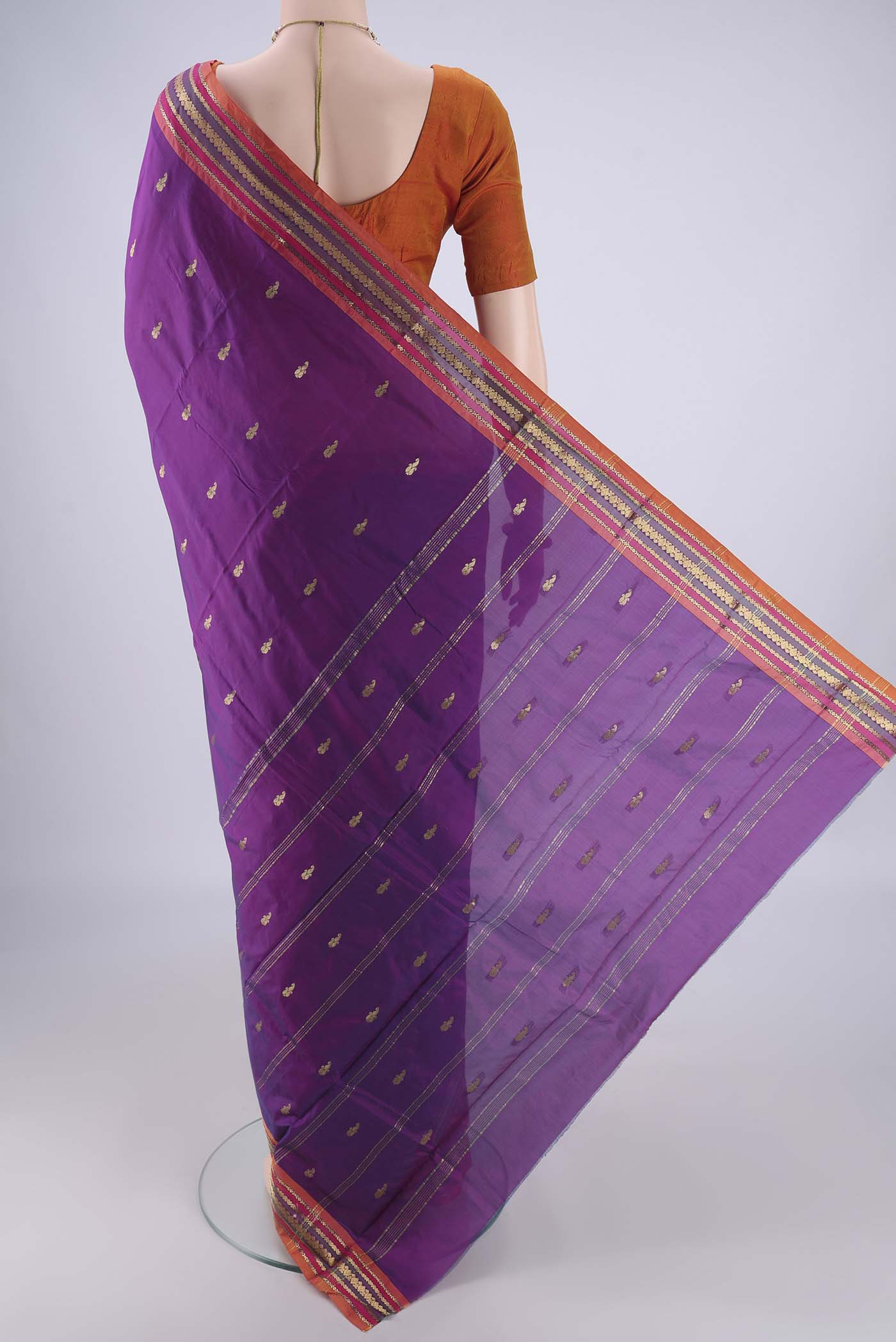 Flat view of Purple Blended Bangalore Silk Saree with Zari Butta on the body and Zari Border. 