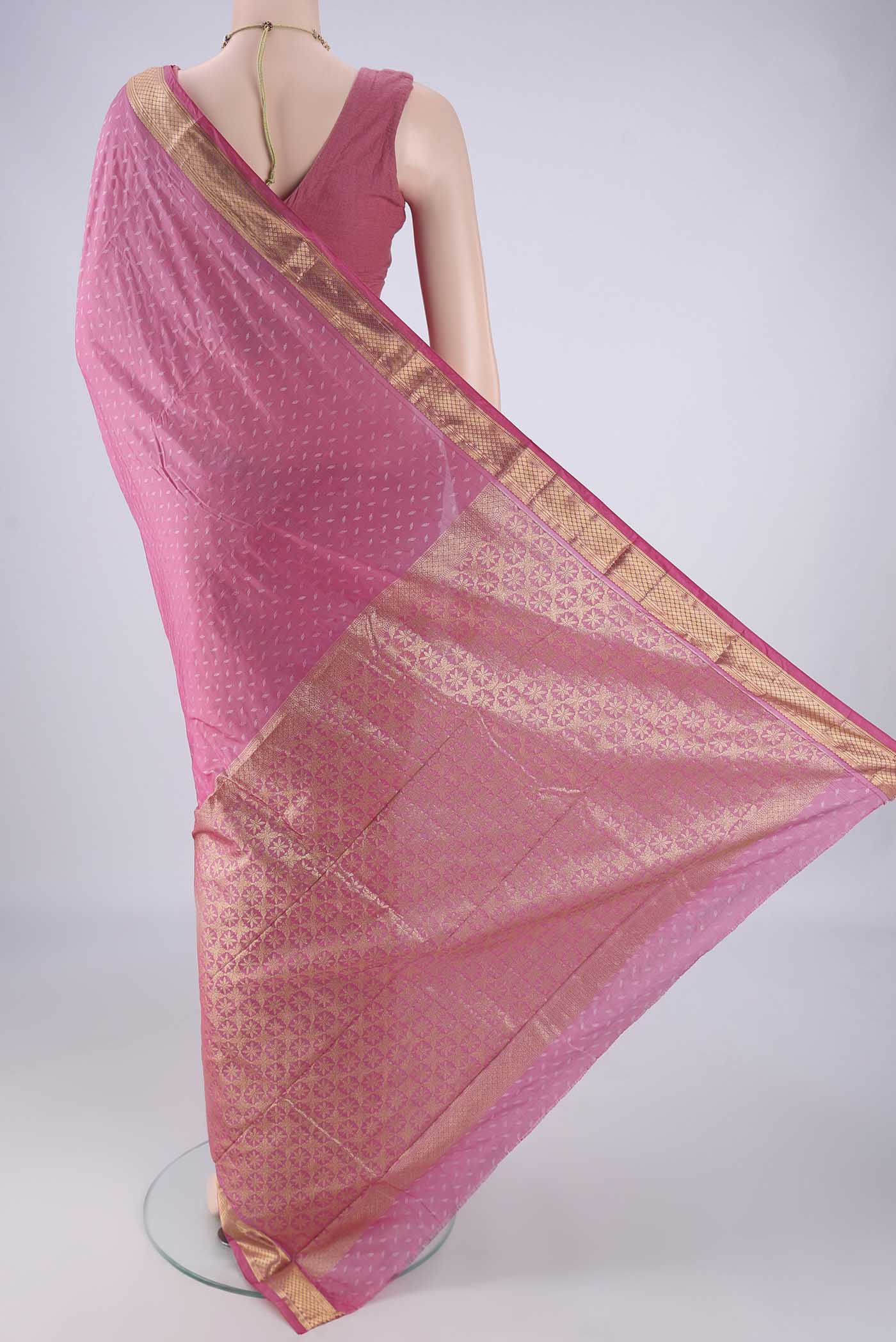 Flat view of Rose pink Blended Bangalore Silk Saree with Jacquard design on the body and Zari Border. 