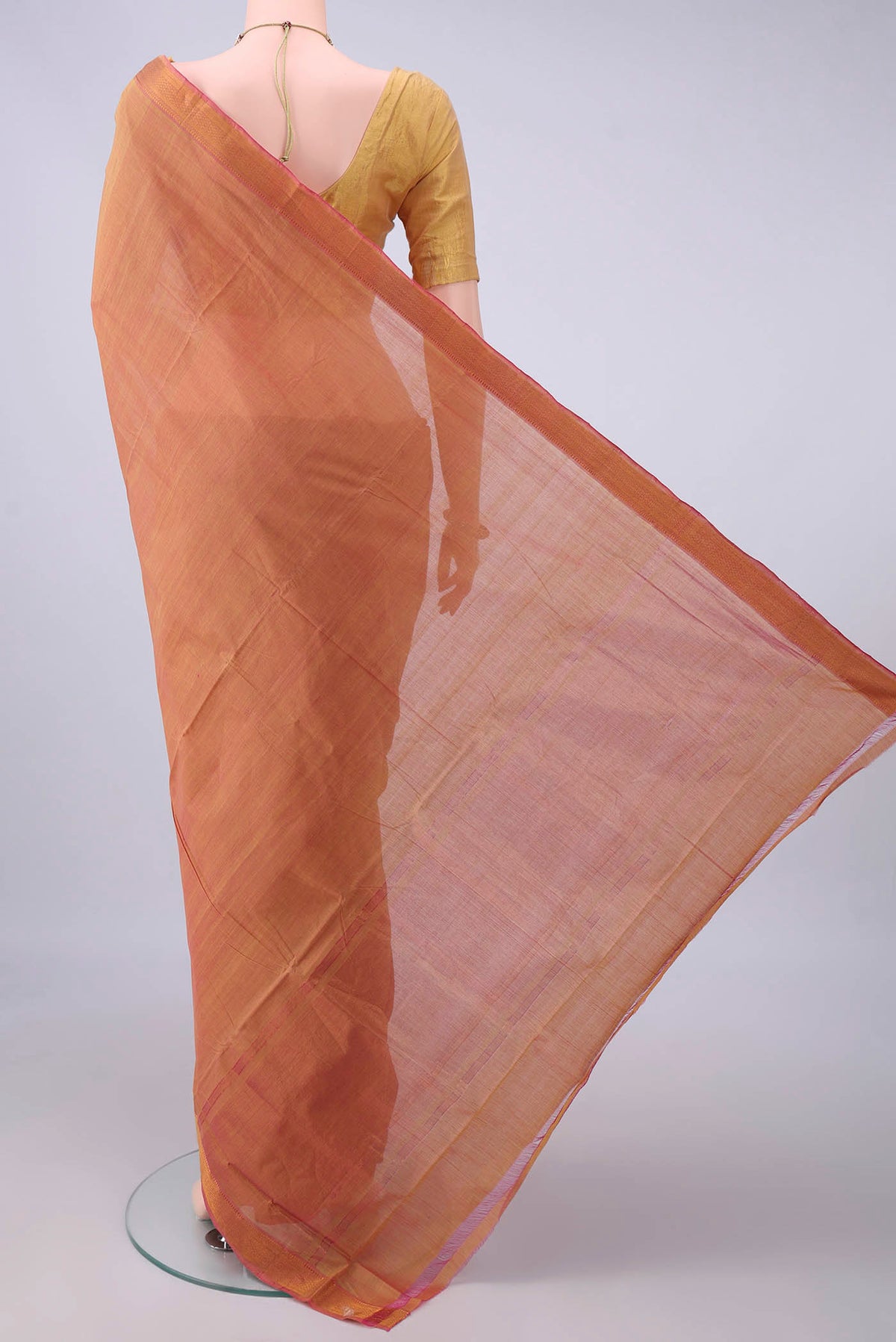 Flat view of Peach Mangalagiri Cotton Saree with Plain Body and Zari Border. 